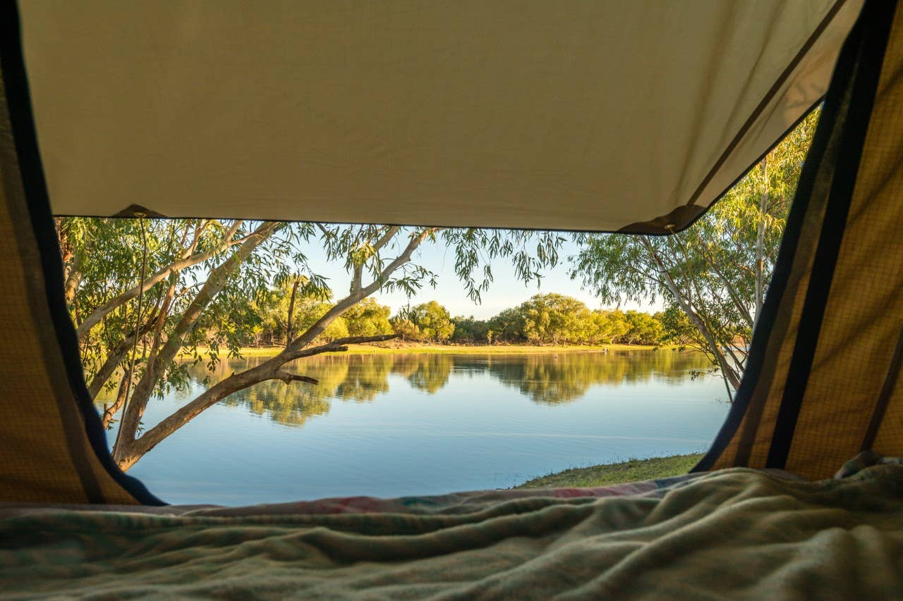 view from a tent overlooking a billabong in NT